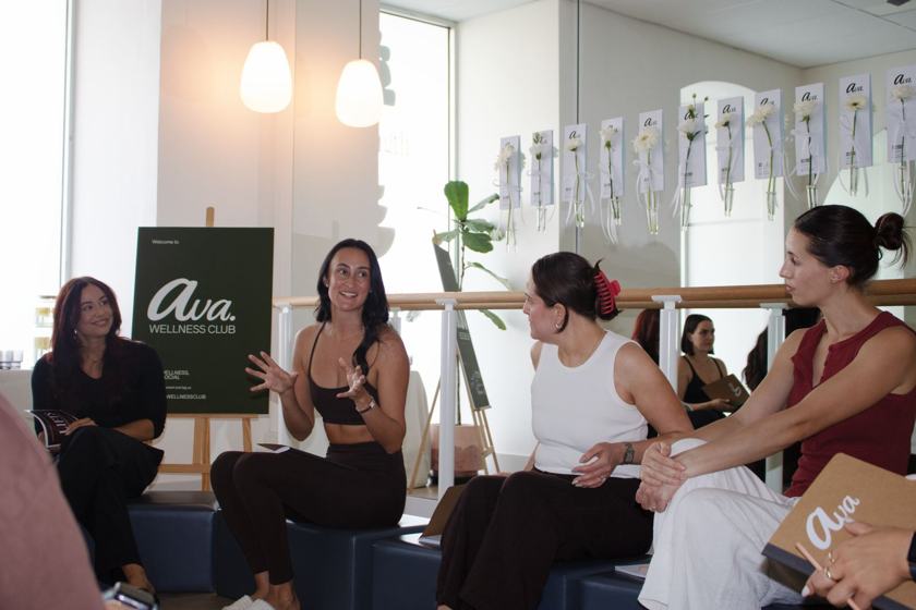 Guests chatting by the barre